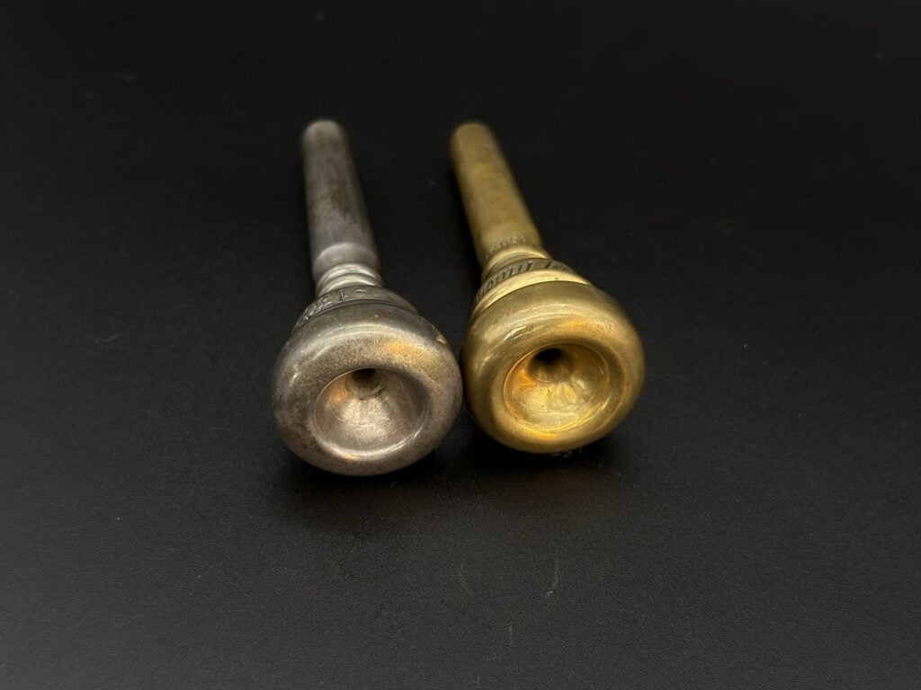 Rudy Muck 13C (left) and Rudy Muck 13C Maynard Ferguson (right). Notice the cup is more shallow and the inside rim more round on the Maynard Ferguson piece.